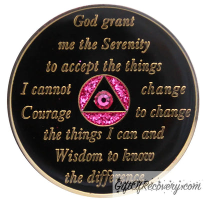 Back of pink glitter Princess unity crystalized AA recovery medallion is black onyx and has the serenity prayer, outer rim, and the circle triangle in the center 14k gold-plated brass, the circle is glitter princess pink and triangle is black with one single pink zircon CZ genuine crystal in the center of the triangle, the recovery medallion is sealed with resin for a shiny finish. 