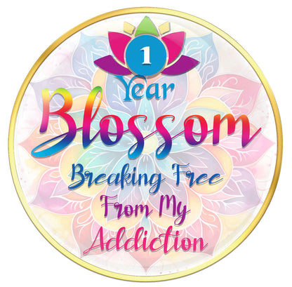 1 year Lotus blossom recovery medallion with vibrant colors of blue, pink, purple, red, and yellow in each pedal of the flower, a symbol of breaking free of our addictions.