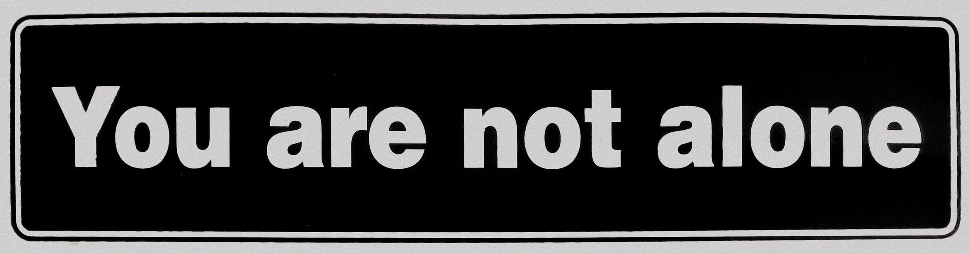 You Are Not Alone Bumper Sticker Black